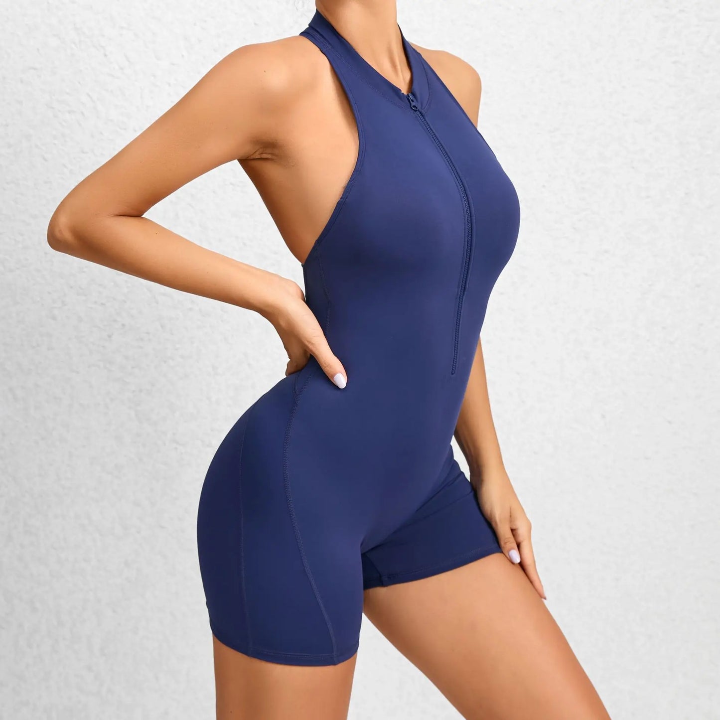 Mono deportivo corto sin mangas para mujer