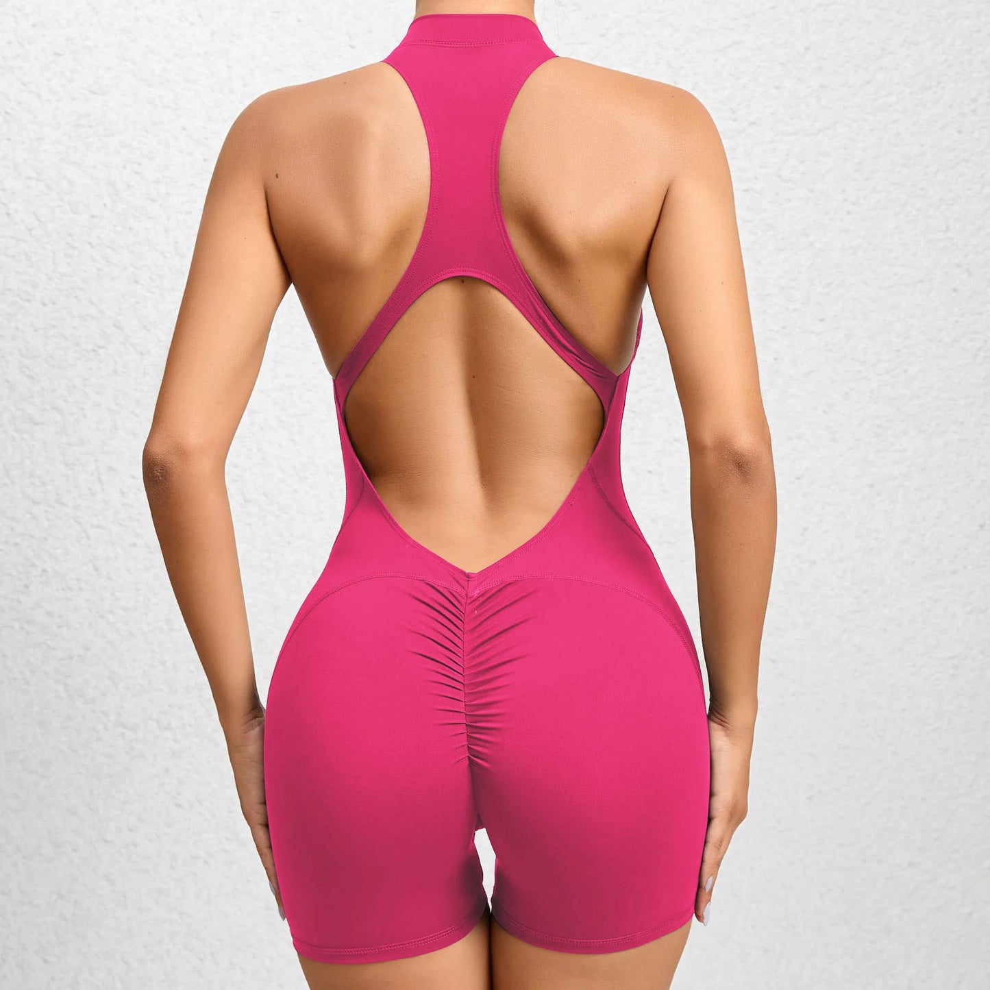 Mono deportivo corto sin mangas para mujer