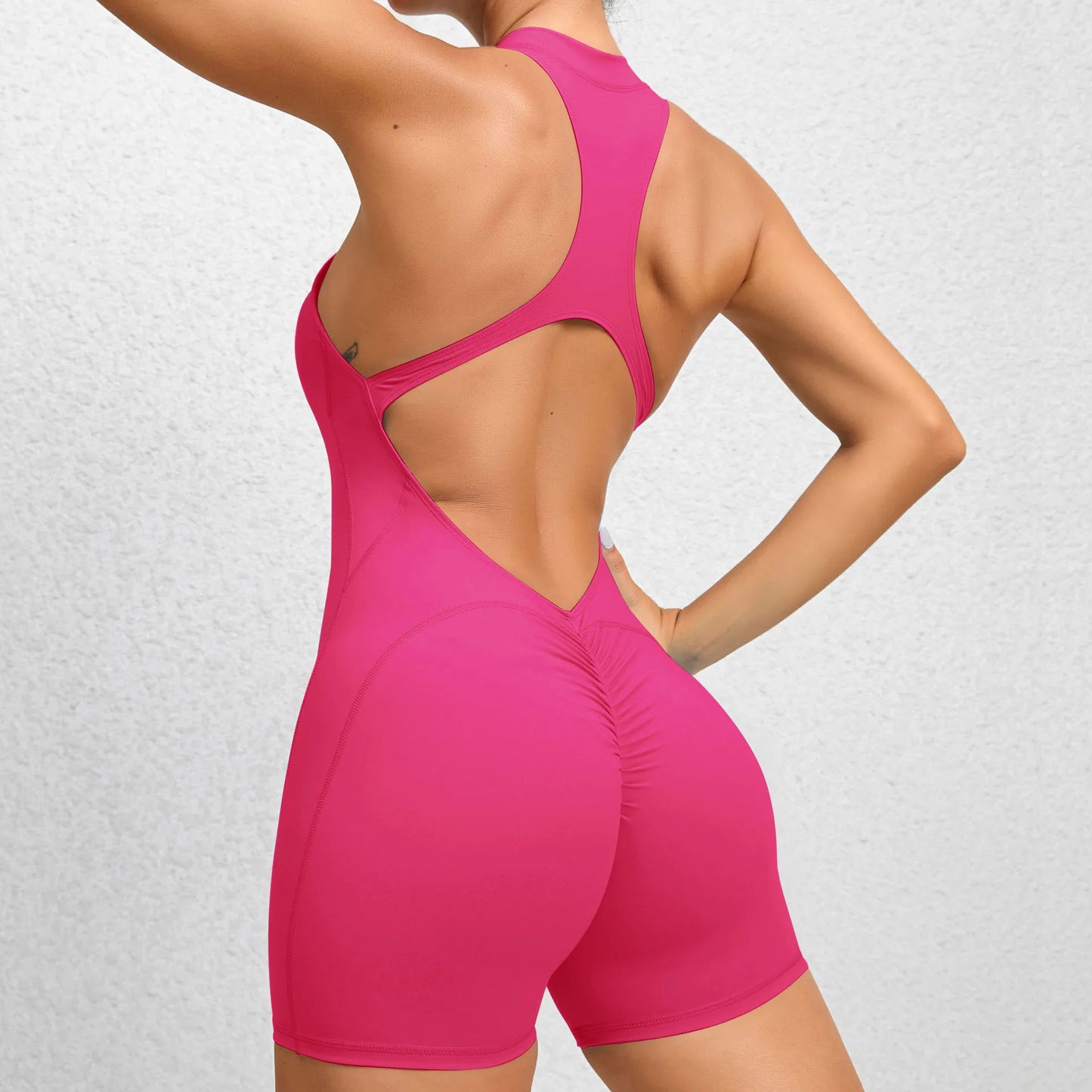 Mono deportivo corto sin mangas para mujer