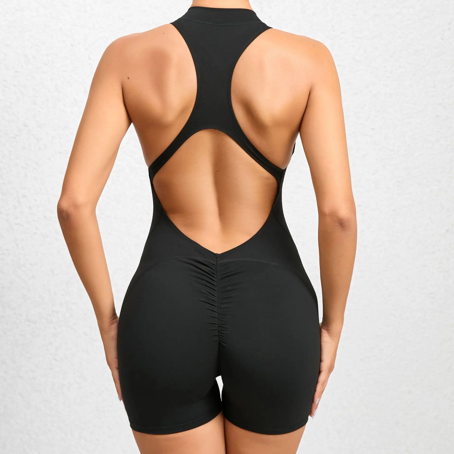 Mono deportivo corto sin mangas para mujer