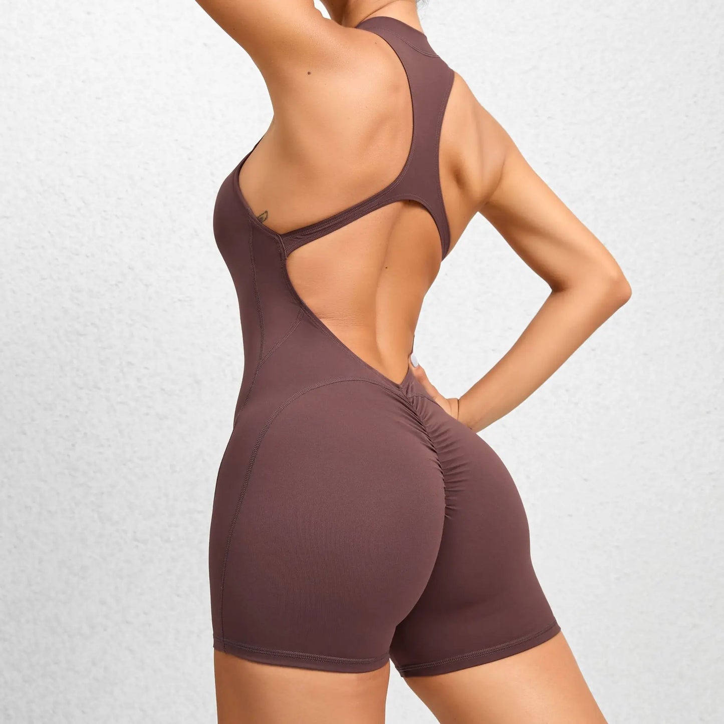Mono deportivo corto sin mangas para mujer