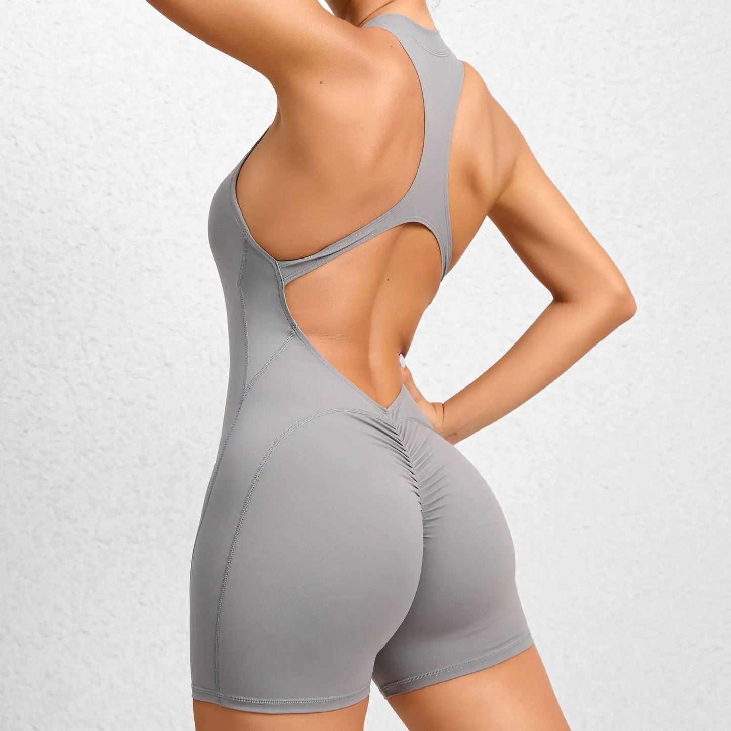 Mono deportivo corto sin mangas para mujer