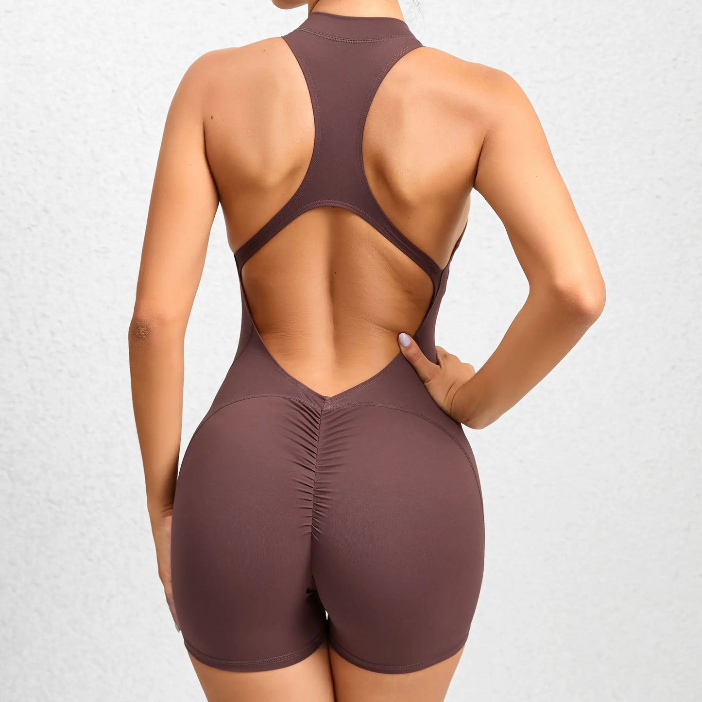 Mono deportivo corto sin mangas para mujer