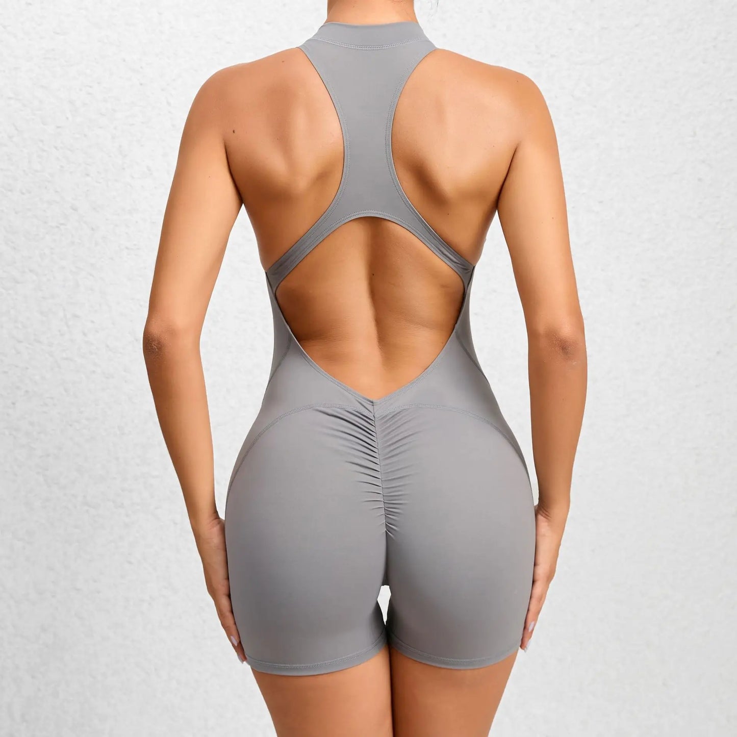 Mono deportivo corto sin mangas para mujer